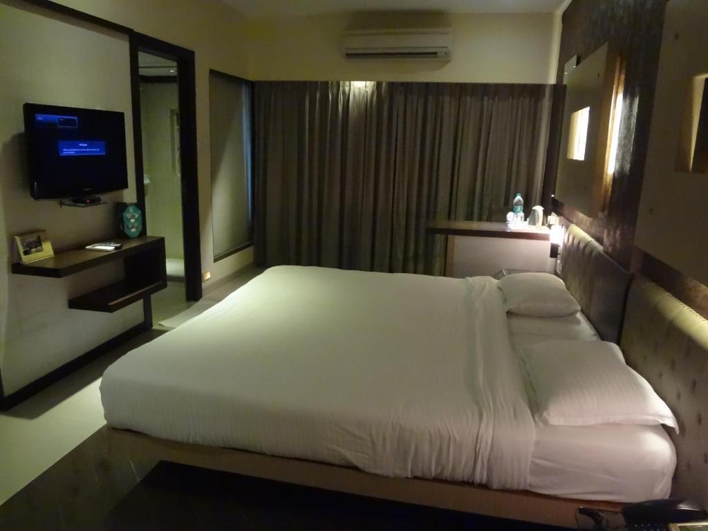 Hotel Capitol Thane Phòng bức ảnh